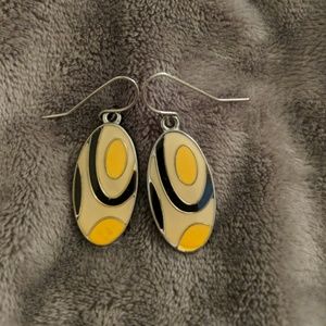 Yellow, black, and white earrings